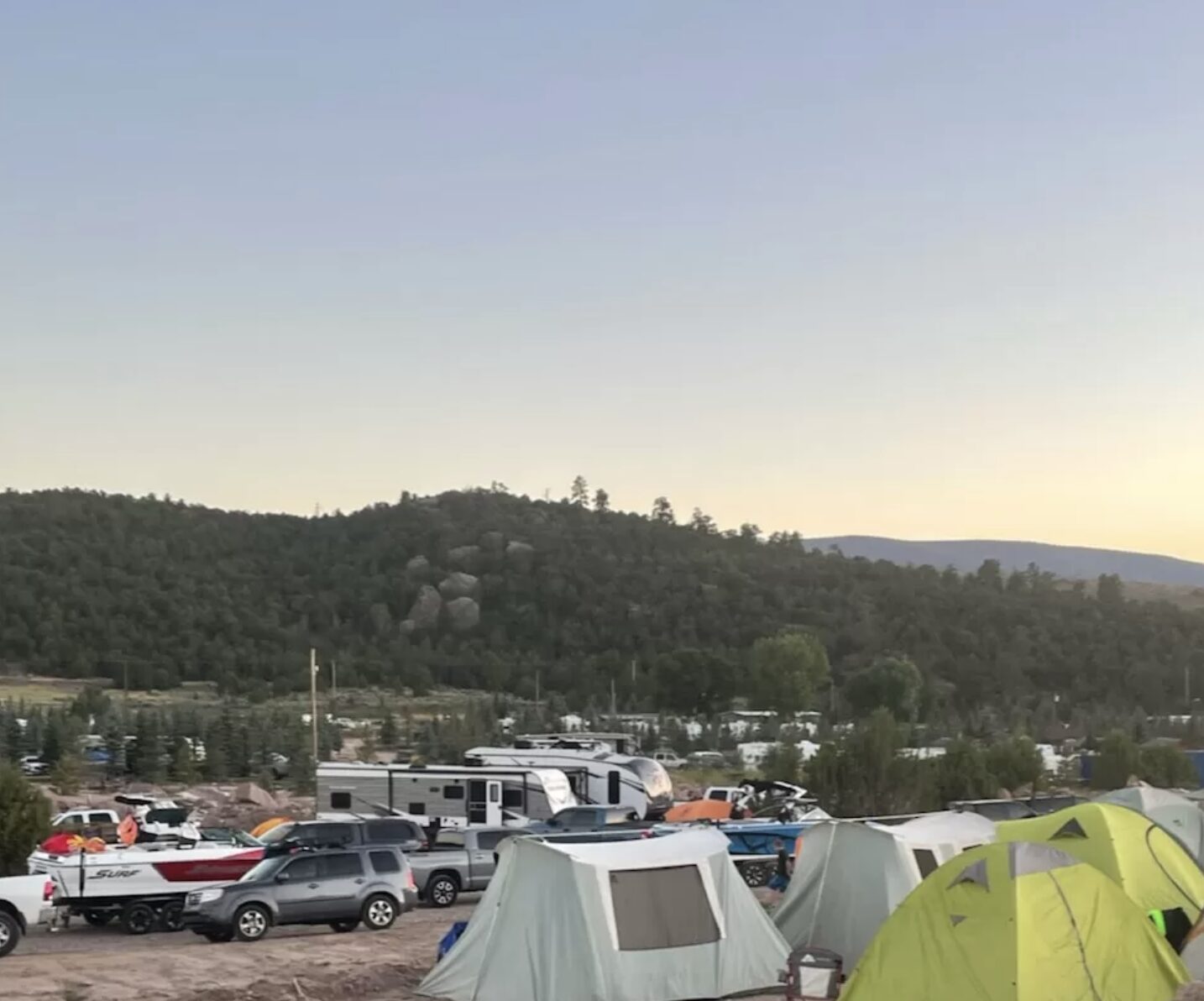 various trailers and cabins in a camping area